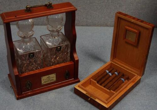 A modern two bottle Tantalus and a cigar humidor.(2)