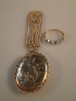 A 9ct gold locket on yellow metal chain