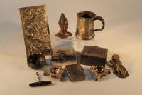 A collection of assorted novelty metal ware items