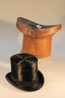 A black silk top hat