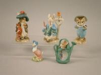 A collection of five items from the Border Fine Arts Beatrix Potter series