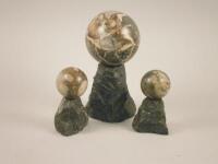 Three turned marble balls