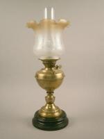 A Victorian and later oil lamp