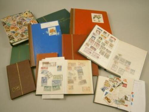 Austria. A stock book and 10 other stock books of mixed stamps
