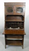 An Edwardian mahogany bureau cabinet