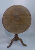 A George III oak tilt top table