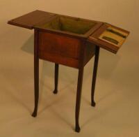 An Edwardian mahogany and chequer banded work table