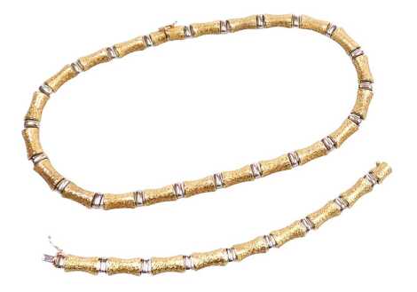 A bi-colour textured link necklace, and matching bracelet, each on a snap clasp, yellow and white metal, stamped 14k, 68.3.