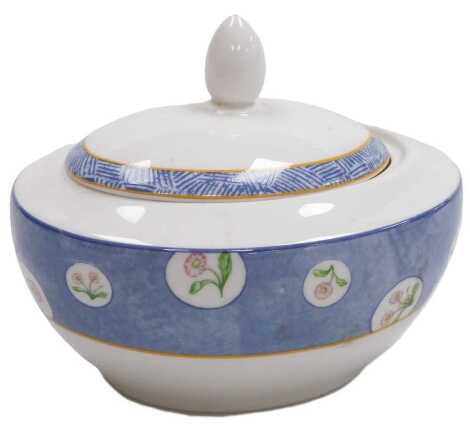 A Royal Doulton porcelain prototype sucrier and cover, decorated with reserves of flowers against a powder blue ground, printed mark, 12.5cm wide.