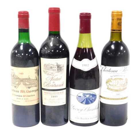 Four bottles of red wine, comprising Nectar des Bertrand Premieres Cotes-de-Blay 2005, Chateau St George St Emilion 1983, Chateau Krwan Grand Grue Margaux 1982, and Jean Bastien Richard Gevrey-Chambertin 1982.