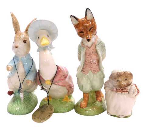 Three Beswick and Royal Albert large Beatrix Potter pottery figures, comprising Foxy Whiskered Gentleman, Jemima Puddle-duck, and Peter Rabbit, together with a Royal Albert figure of Mrs Tiggywinkle, all boxed. (4)