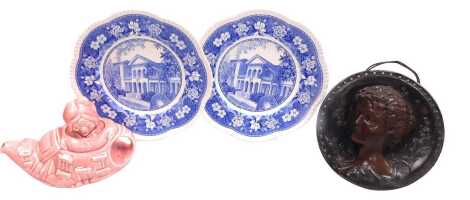 A late 19thC continental pottery wall plaque, of circular form, decorated in relief with the bust portrait of a lady, 22cm wide, together with a pair of Wedgwood blue and white pottery plates, printed with Sweet Briar House, Sweet Briar College, printed m