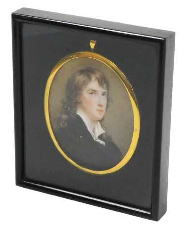 English School (early 19thC). Half length miniature portrait of a gentleman, with long flowing hair, watercolour, framed and outer strut framed, 8cm x 6.5cm.