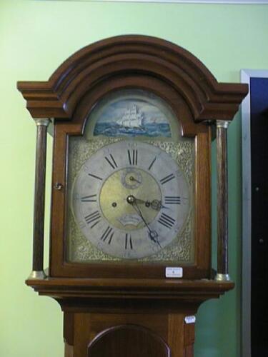 An oak longcase clock by C R DYSON of BOURNE