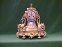 A 19thC gilt metal mantel clock by JAPY FRERES