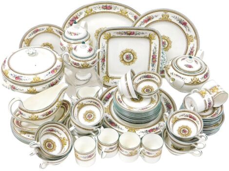 A Wedgwood porcelain Columbia pattern part dinner tea and coffee service, comprising an oval meat platter, vegetable tureen and cover, sauce boat on stand, five dinner and dessert plates, six soup cups and saucers, teapot, coffee pot, cream jug and sucrie