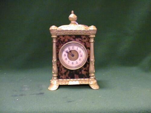 A late 19thC German small mantel timepiece