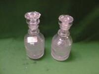 A pair of Regency hob-nail cut crystal spirit decanters