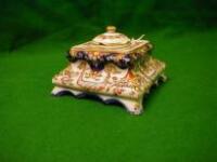 A Delft inkwell, of square cushion form, with removable inkwell and cover,