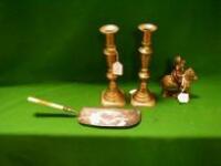 A pair of late 19thC brass candlesticks with fluted and turned tapering columns