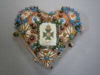 An early 20thC sweetheart forget-me-not pin cushion for the King Corps.