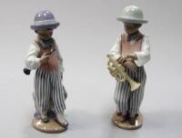 A pair of Lladro musician figures