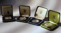 Four Royal Mint commemorative crowns