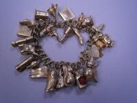 A 9ct gold charm bracelet