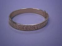 A floral engraved bangle