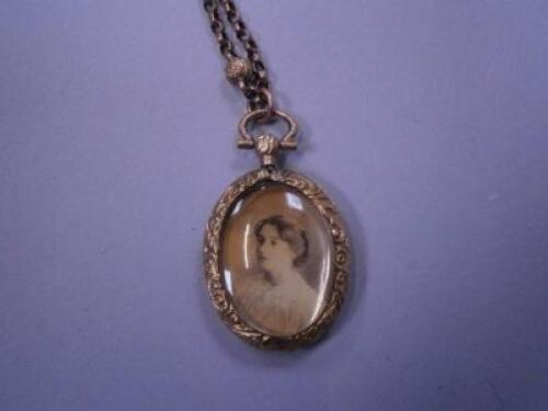 A necklace with portrait pendant