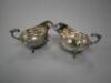 A pair of modern silver sauce boats