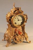 An American gilt cased rococo style mantel clock