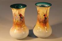 A pair of Royal Doulton baluster vases