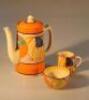 A Clarice Cliff bizarre Fantasque melon pattern three piece tea service