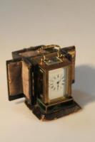 An early 20thC travelling miniature carriage clock