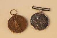 Two WWI service medals awarded to Private W Martin. Lincolnshire Regiment no. 1940.