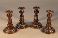 Four Sheffield plate telescopic candlesticks.