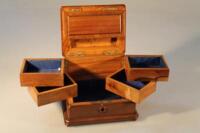 A late 19thC walnut compartmentalized jewellery box