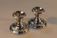 A pair of modern silver candlesticks