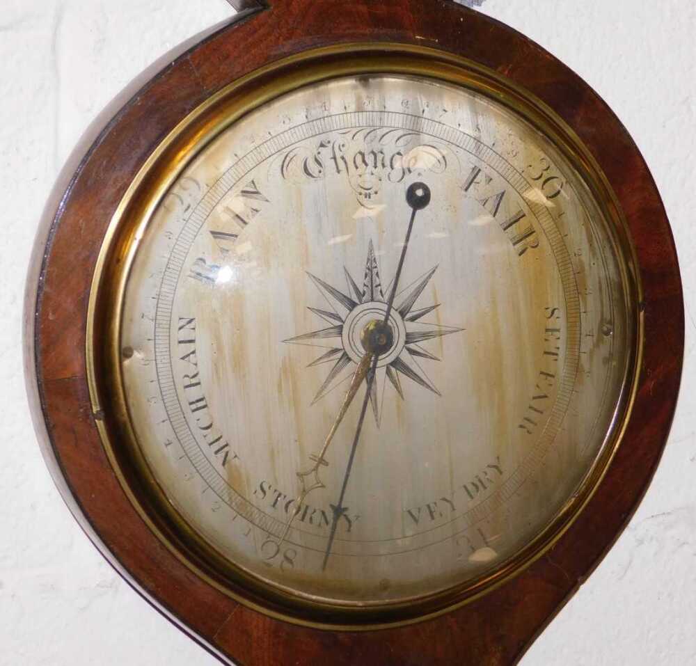 Young Barometer A Georgian mahogany cased wheel barometer by Court & Company of ...