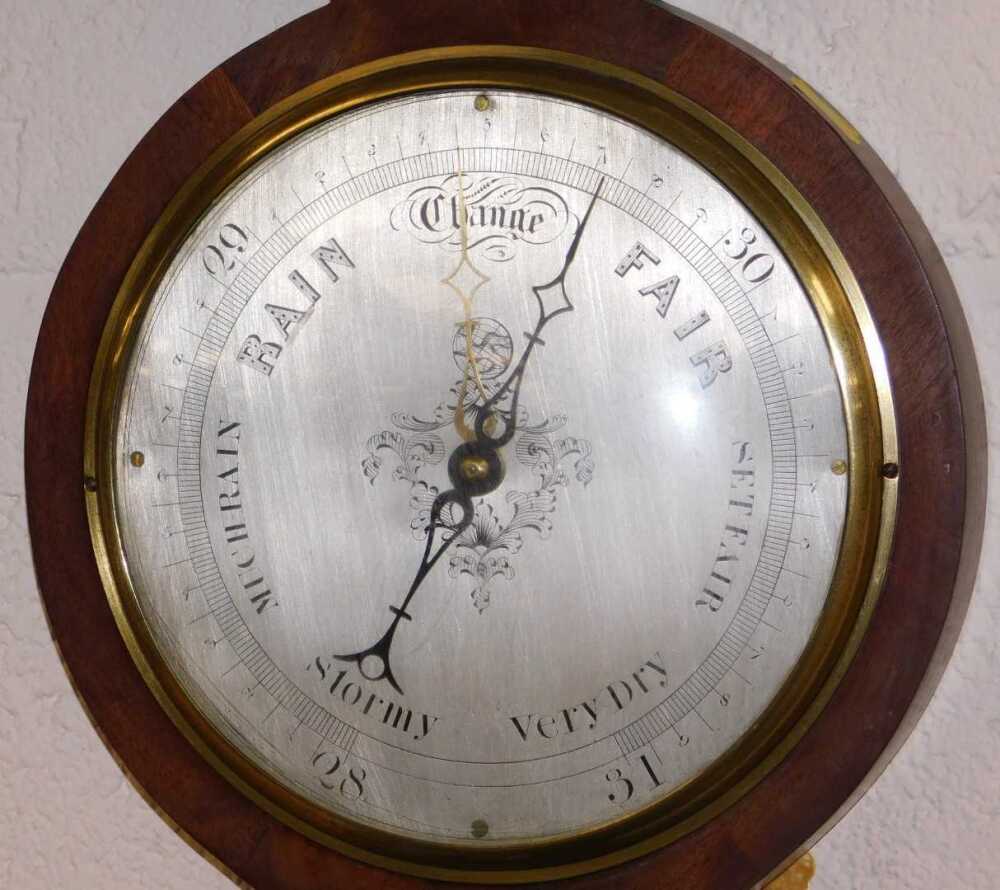 Young Barometer A Georgian mahogany cased wheel barometer by Benham of Collumpton, with ...