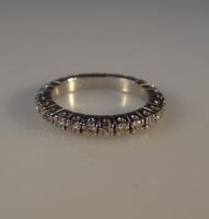 A diamond full hoop eternity ring