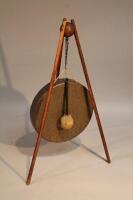 An early 20thC gong on tripod stand