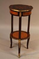 A Louis XVI style two tier occasional table or torchere stand