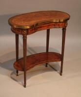 A modern reproduction walnut veneered kidney shaped table