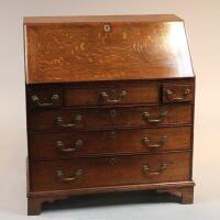 A late 18thC oak bureau