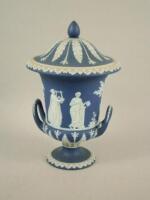 A Wedgwood blue Jasper ware campana shaped urn and cover