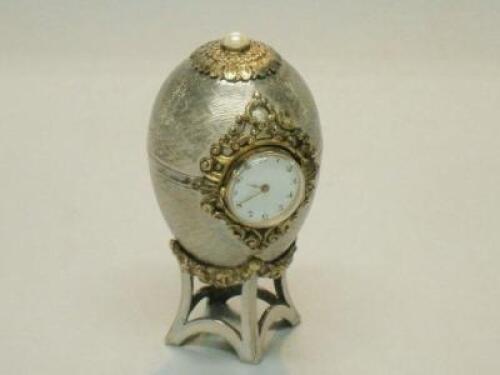 A novelty silver and silver gilt egg shaped timepiece