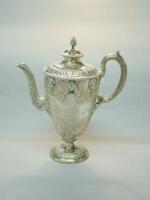 A Victorian silver coffee pot