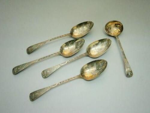A set of four silver gilt spoons